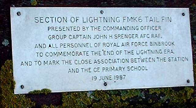 Section of Lightning FMK6 tail fin presented by the Commanding Officer Group Captain John H Spencer AFC RAF, and all personnel of Royal Air Force Binbrook to commemorate the end of the Lightning era, and to mark the close association between the station and the CE Primary Schooj 19 June 1987.